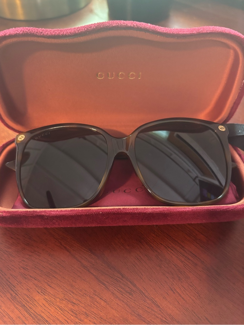 Gucci Women’s Tortoise Frame Sunglasses with Black Lenses